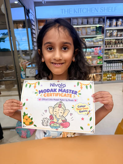 A little chef with her Nivala Modak Master certificate