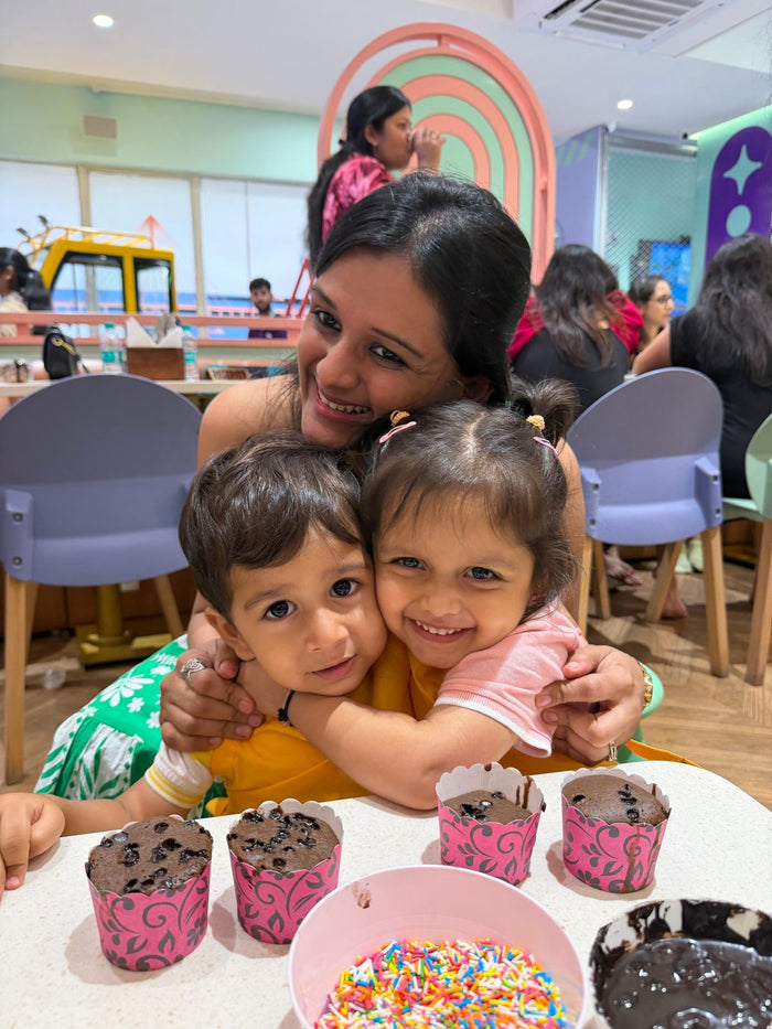 Two little chefs hugging